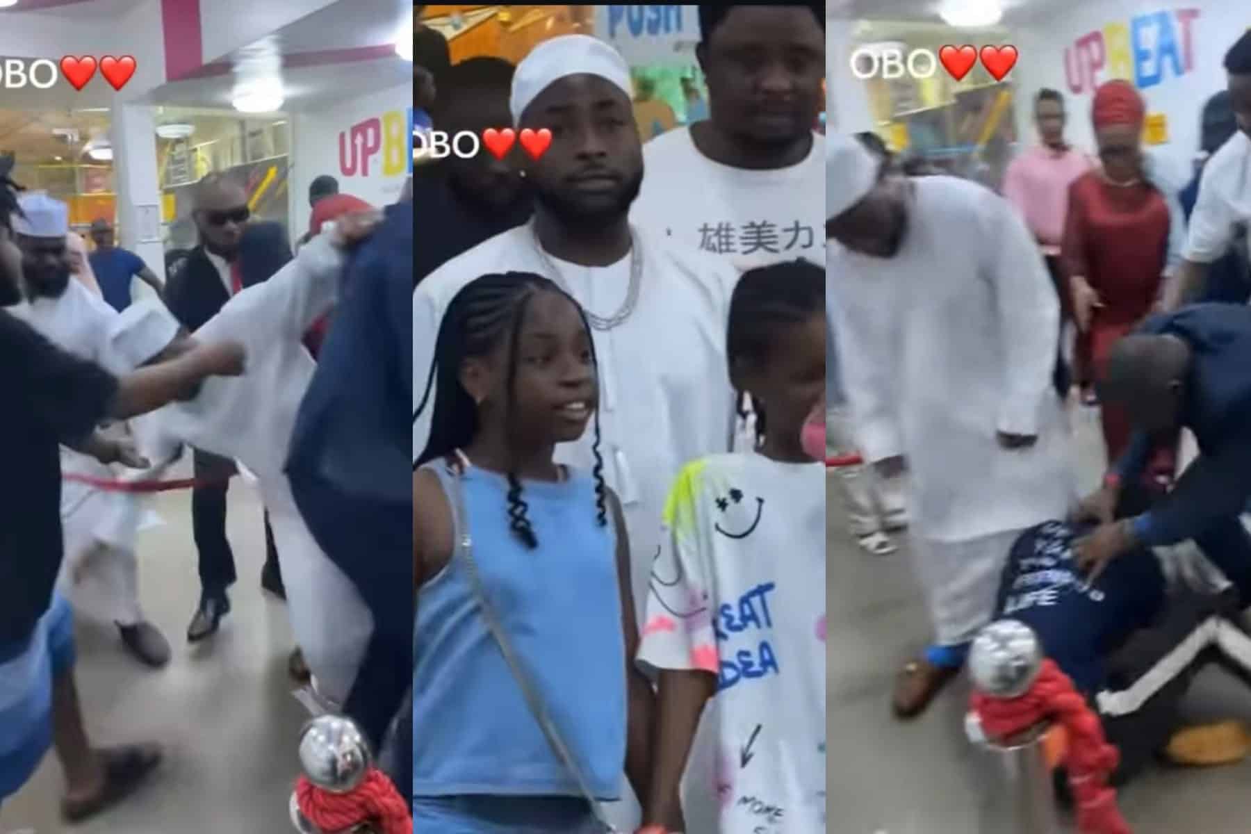 Fan drags Davido's leg